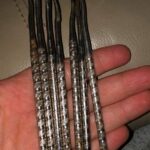 I pulled out shoes I haven’t worn all winter and found white fuzzy patches growing on the leather. What is this?